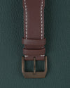 IWC Pilot's Watch Automatic Spitfire IW326802 - Close-up van de gesp met IWC-logo op de bruine leren band