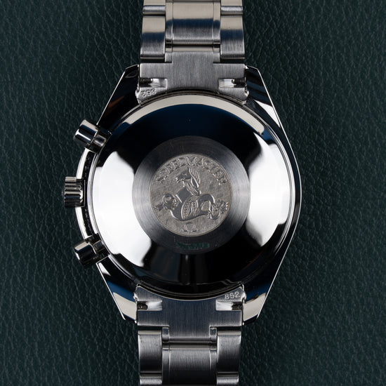 Omega Speedmaster Day-Date 3520.50 - gesloten stalen caseback met gegraveerd Speedmaster zeepaardje logo