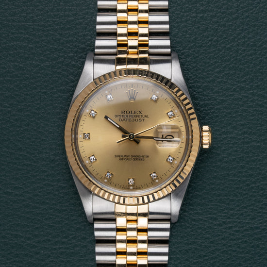 Rolex Datejust 16013 Champagne Diamanten Dial - frontaal aanzicht van de champagnekleurige wijzerplaat met diamanten uurmarkers en Jubilee-band