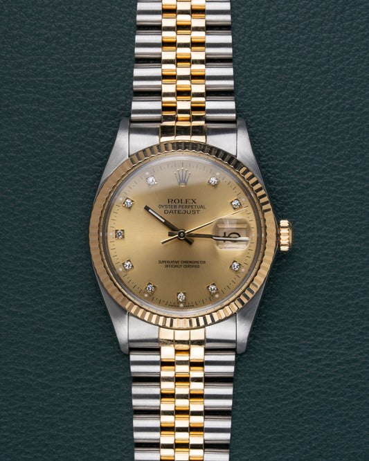 Rolex Datejust 16013 Champagne Diamanten Dial - frontaal aanzicht van de champagnekleurige wijzerplaat met diamanten uurmarkers en Jubilee-band