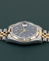 Rolex Datejust 16233 Blue Dial - zijaanzicht van de kast met kroon verborgen aan andere zijde