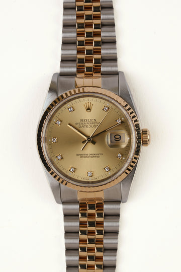 Rolex Datejust 16233 - vooraanzicht van de champagne wijzerplaat met diamanten indexen, geribbelde gouden bezel en armband