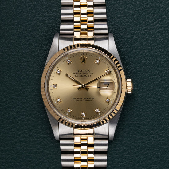 Rolex Datejust 16233 Champagne Diamond Dial - frontaal aanzicht met diamanten uurmarkeringen en Jubilee band