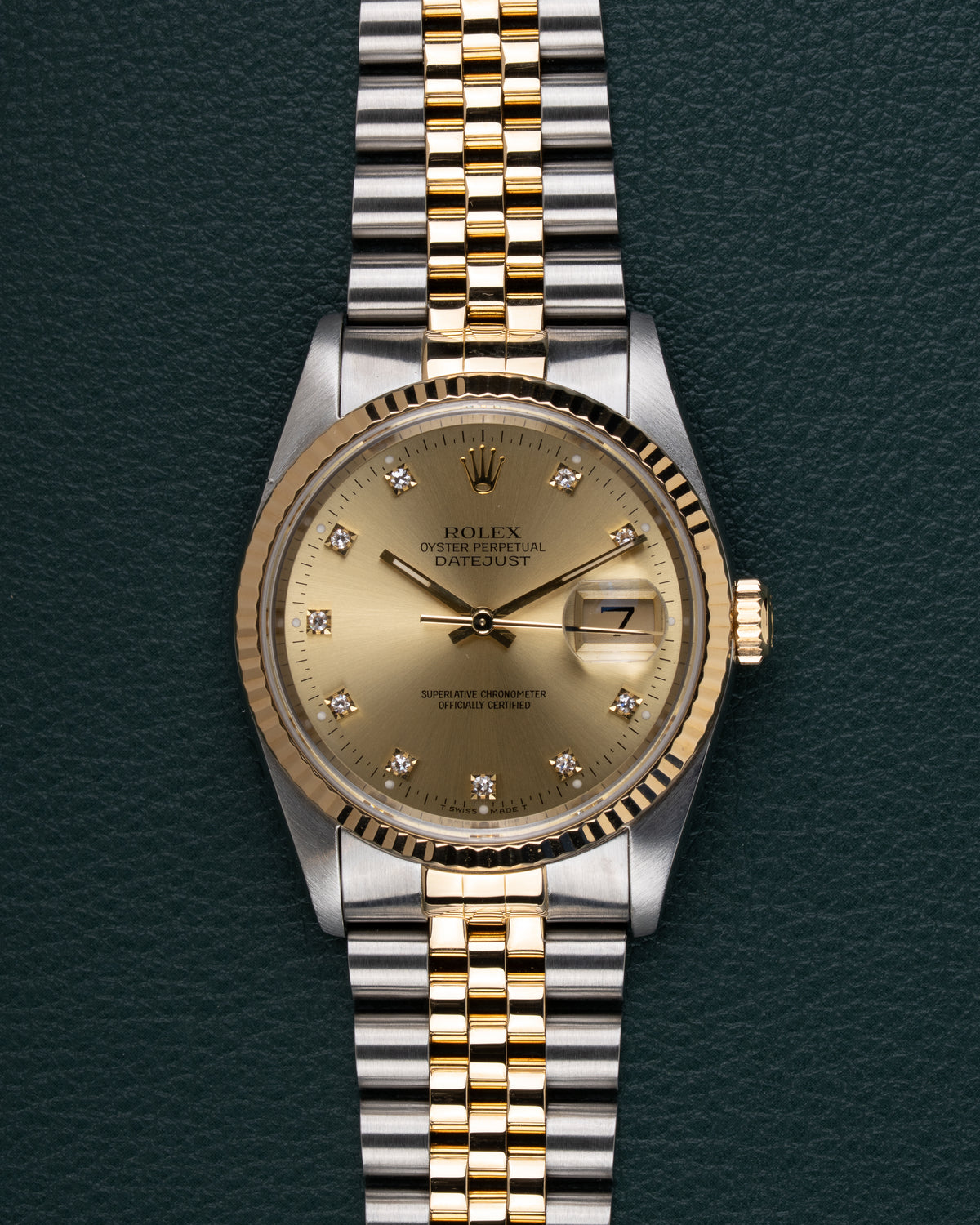 Rolex Datejust 16233 Champagne Diamond Dial - frontaal aanzicht met diamanten uurmarkeringen en Jubilee band
