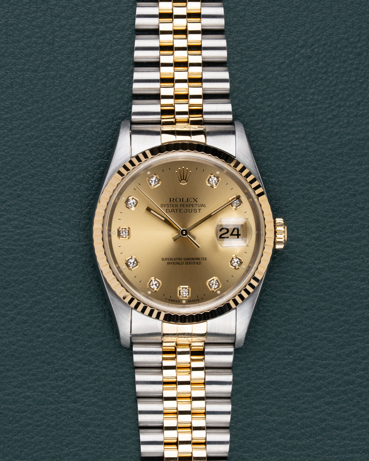 Rolex Datejust 16233 Champagne Diamond Dial - frontaal aanzicht met diamanten uurmarkeringen en Jubilee band