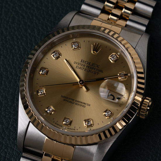 Rolex Datejust 16233 Champagne Diamond Dial - extreme close-up van diamanten uurmarkeringen en fluted bezel