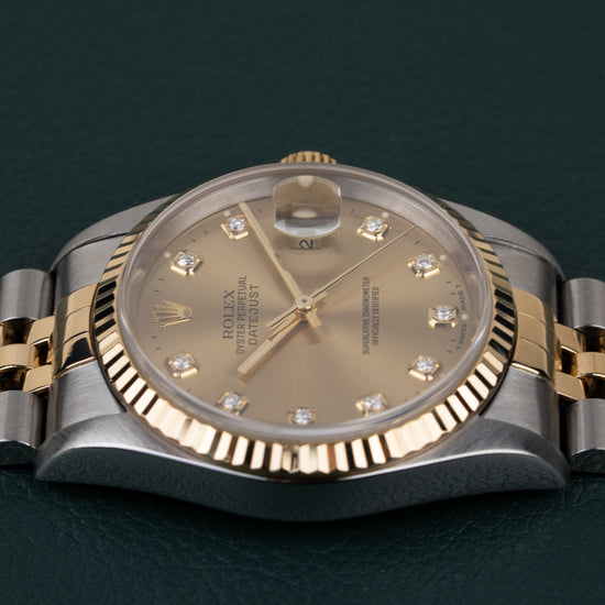 Rolex Datejust 16233 Champagne Diamond Dial - zijaanzicht van de kast met kroon verborgen aan andere zijde