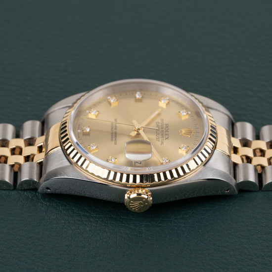 Rolex Datejust 16233 Champagne Diamond Dial - zijaanzicht van de kast vanaf de andere zijde met kroon