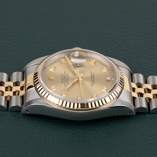 Rolex Datejust 16233 Champagne Diamond Dial - bovenaanzicht van de kast met kroon