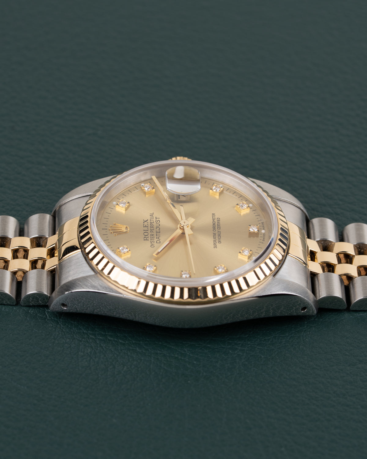 Rolex Datejust 16233 Champagne Diamond Dial - bovenaanzicht van de kast met kroon