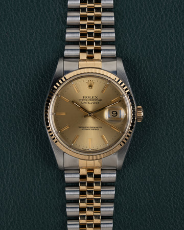 Rolex Datejust 16233 - Volledig horloge recht van boven met champagnekleurige wijzerplaat en Jubilee band in staal en goud